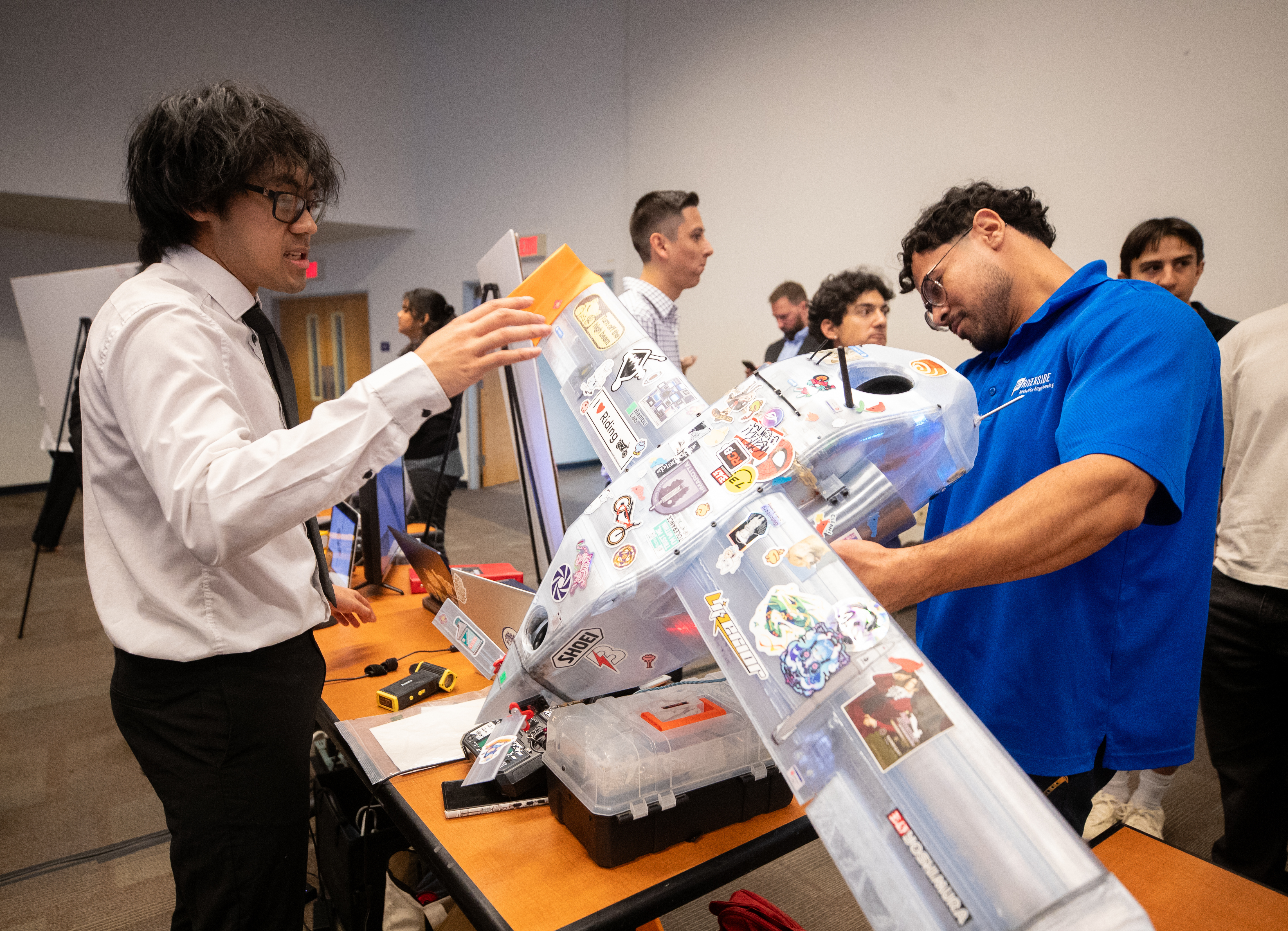 BCOE students sharing senior design project materials during the showcase