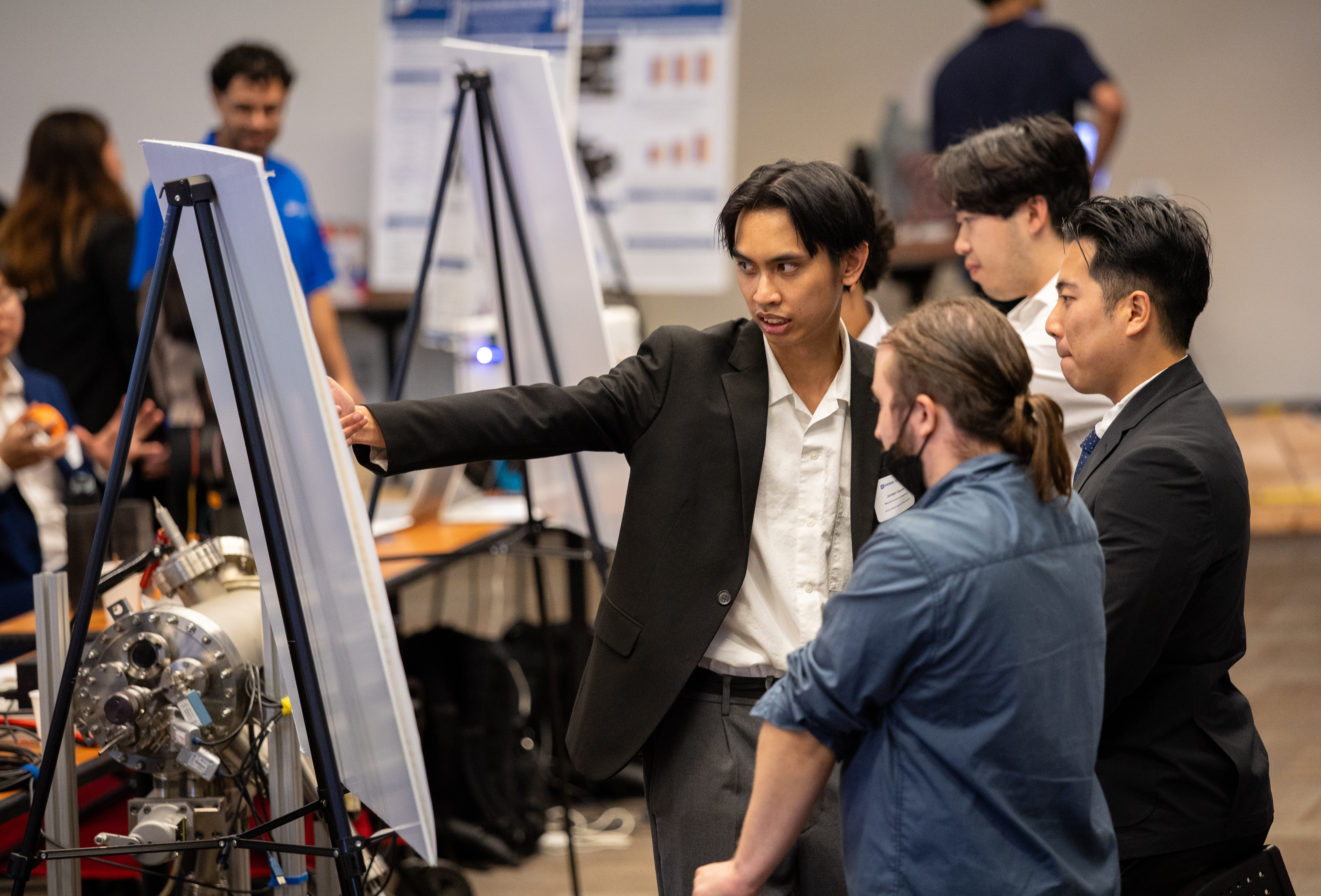 BCOE senior design showcase attendees viewing student projects