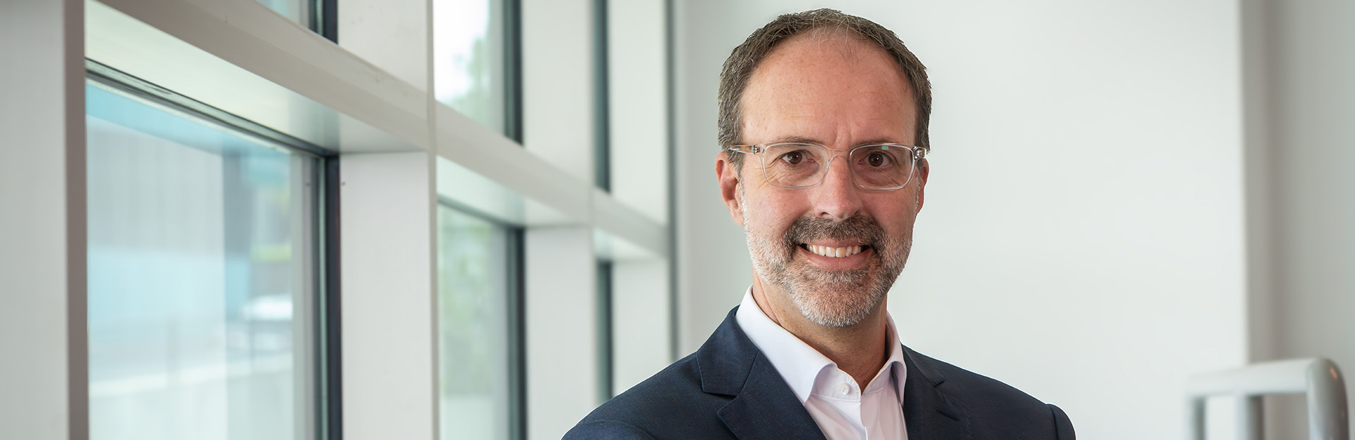 Photo of adult male executive and UCR engineering alum named Ryan Reid