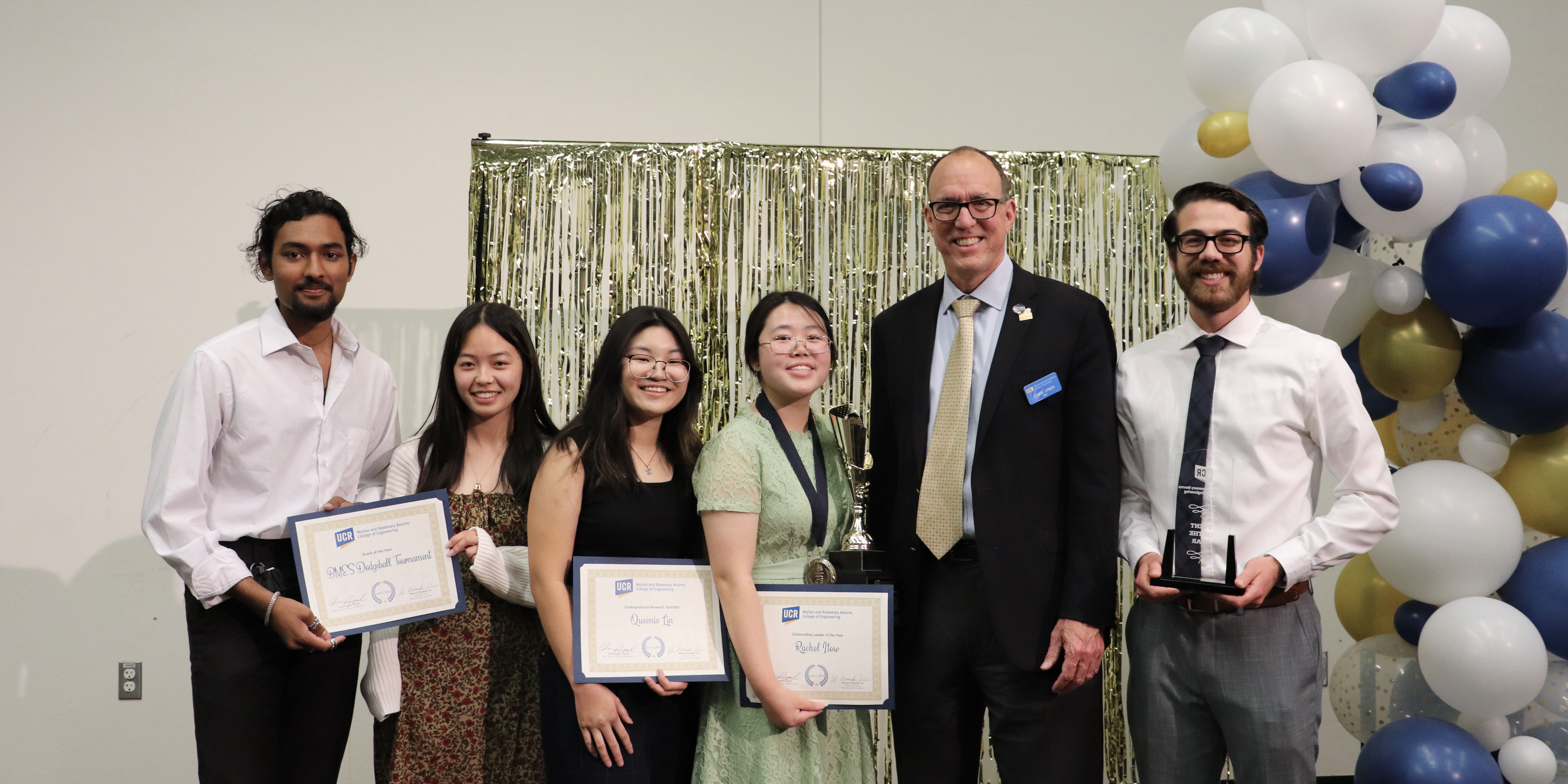 Dean Lynch with scholarship recipients