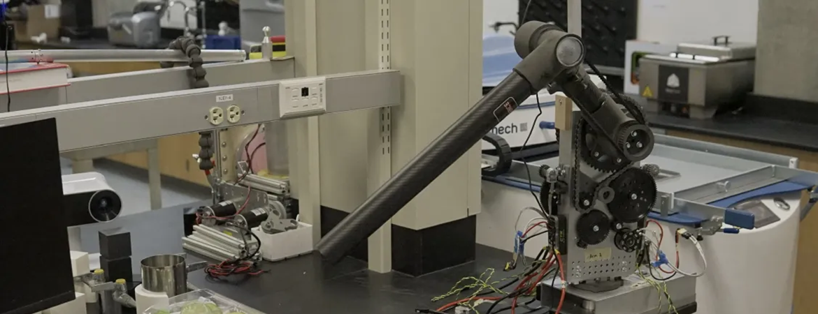 Photo of robot arm in the UCR Mechanical Engineering Design and Development Lab
