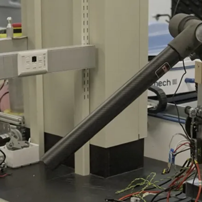 Photo of robot arm in the UCR Mechanical Engineering Design and Development Lab