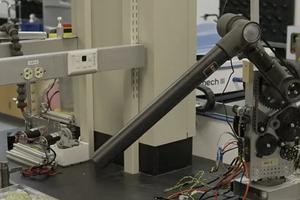 Photo of robot arm in the UCR Mechanical Engineering Design and Development Lab
