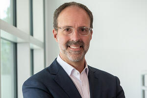 Portrait of Ryan Reid, a BCOE alum and president of Boeing Satellite Systems