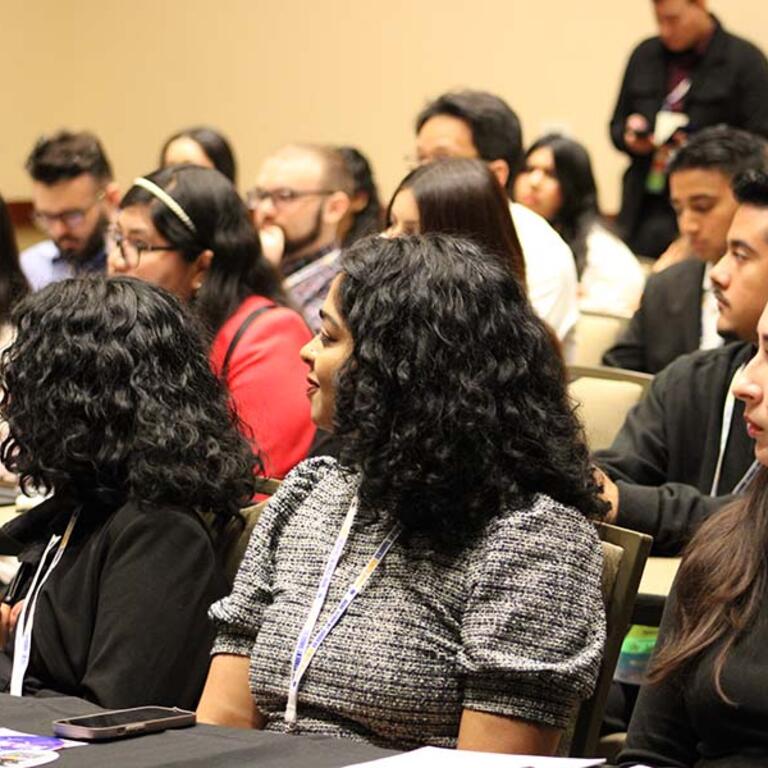 conference attendees at a breakout session 