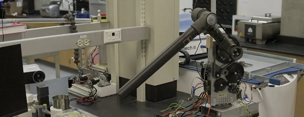 Photo of robot arm in the UCR Mechanical Engineering Design and Development Lab