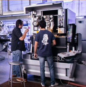 students working in machine shop