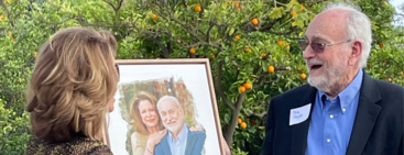 Professor Payne receiving surprise gift