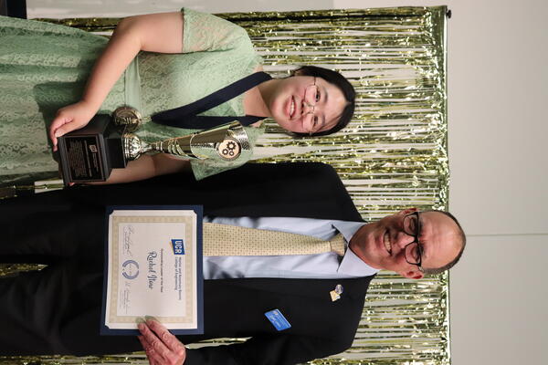 Rachel getting award from Dean Lynch