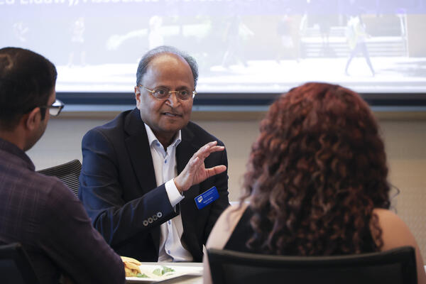 Dr. Gupta engaged in discussion with students
