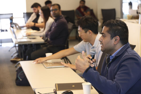 Students and faculty engaged in discussion 