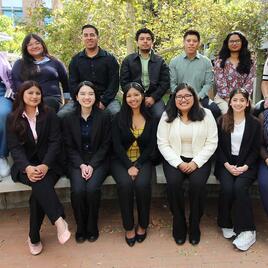 BCOE Student Success Peer Mentors  student mentors and professional staff in business attire posing outdoors