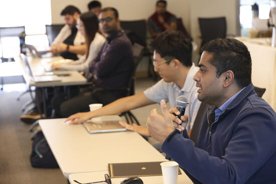 Students and faculty engaged in discussion 